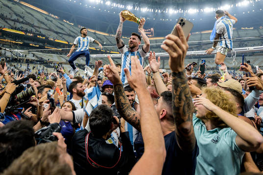 Lionel Messi of Argentina celebrates with the FIFA World
