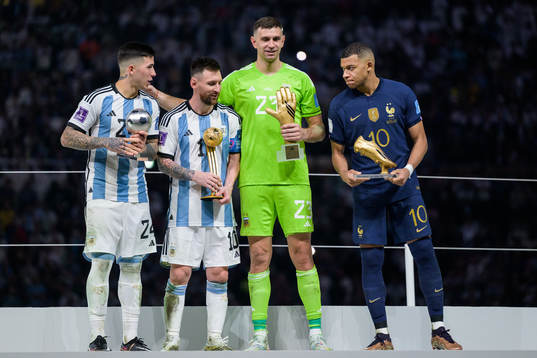 Enzo Fernandez, Lionel Messi, goalkeeper Emiliano Martinez