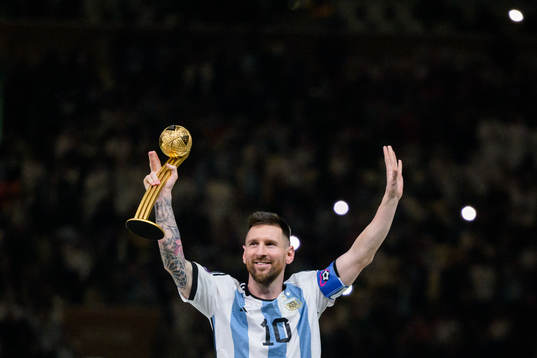 Lionel Messi of Argentina with his award