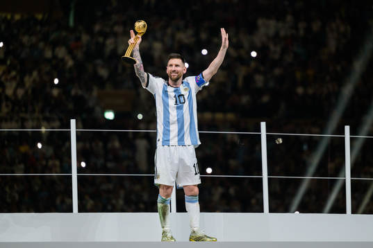 Lionel Messi of Argentina with his award