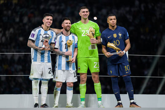 Enzo Fernandez, Lionel Messi, goalkeeper Emiliano Martinez