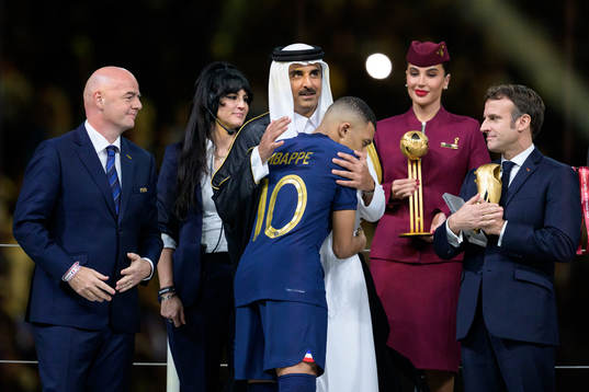 Kylian Mbappe of France and Tamim bin Hamad Al Thani, Emir