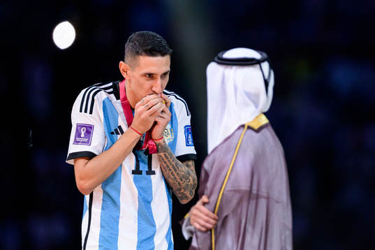Angel de Maria of Argentina kisses his gold medal