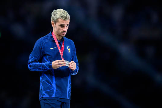 Antoine Griezmann of France looks dejected