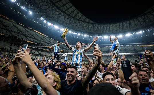 Lionel Messi of Argentina celebrates with the World Cup