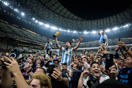 Lionel Messi of Argentina celebrates with the World Cup
