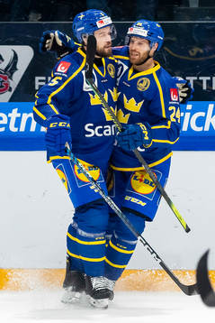 Oscar Fantenberg and Oscar Lindberg of Sweden celebrate