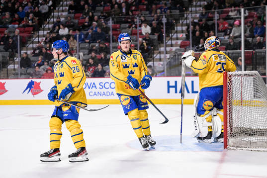 Victor Stjernborg, Elias Pettersson and goaltender Carl