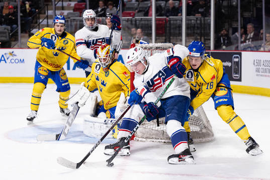 Jackson Blake of USA against goaltender Carl Lindbom and