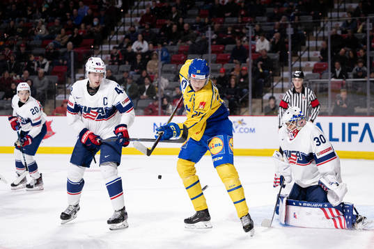 Milton Oscarson of Sweden against Luke Hughes and