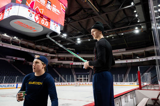 Goaltender Marcus Brännman and Adam Engström of Sweden