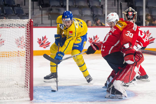 Milton Oscarson of Sweden scores the 1-1 goal