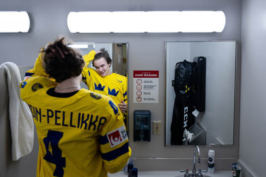 Axel Sandin-Pellikka of Sweden prepares for a team photo