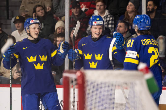 Filip Bystedt of Sweden celebrate with Adam Engström and