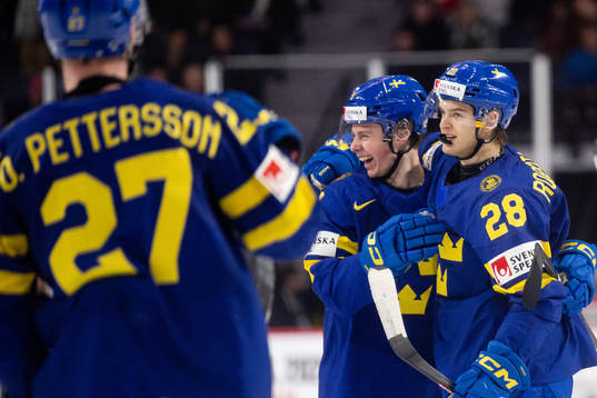 Ludvig Jansson and Simon Robertsson of Sweden celebrate the