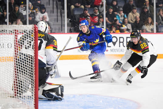 Fabian Lysell of Sweden against goaltender Nikita Quapp and