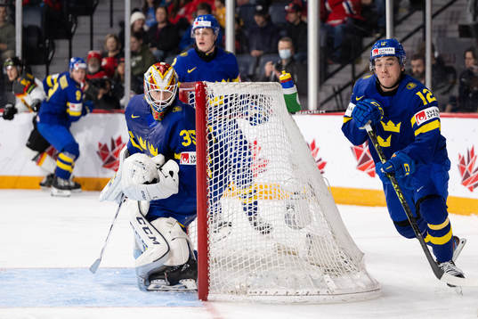 Goaltender Carl Lindbom and Noah Östlund of Sweden