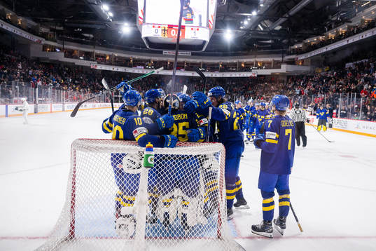 Players of Sweden celebrate