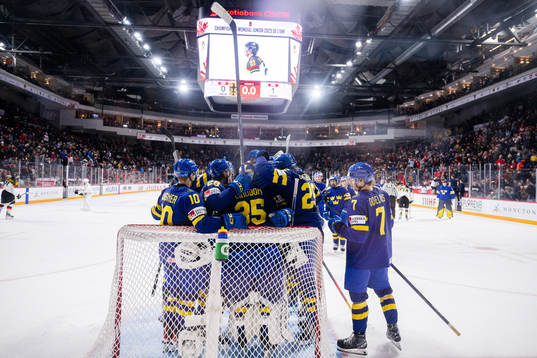 Players of Sweden celebrate