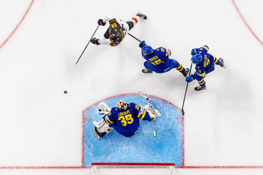 Roman Kechter of Germany against goaltender Carl Lindbom ,