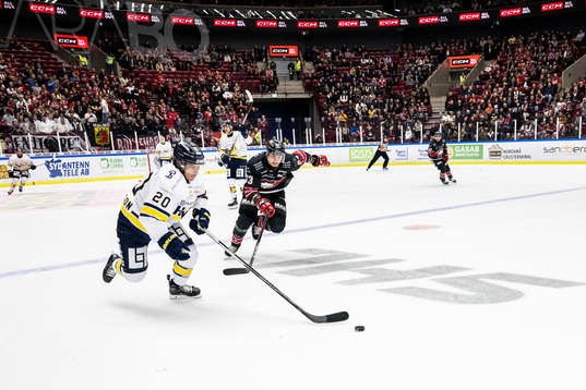HV71s André Petersson och Malmö Redhawks Fredrik