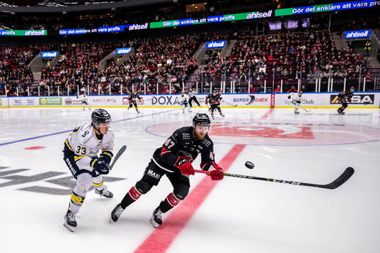 HV71s Måns Lindbäck och Malmö Redhawks Joakim Ryan