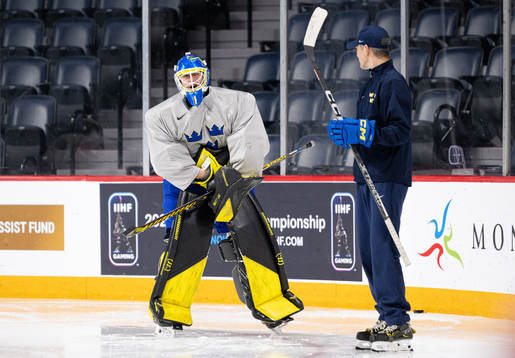 Goaltender Ian Blomquist of Sweden in pain