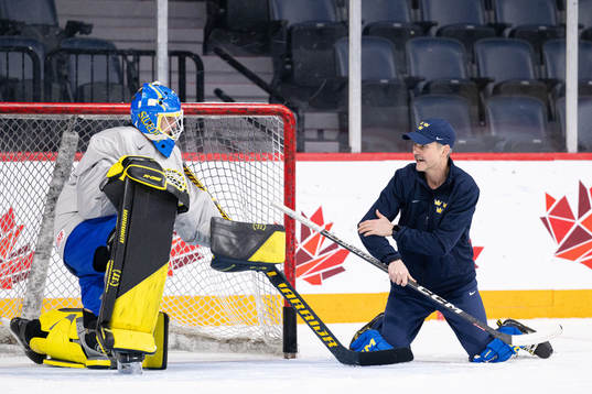 Goaltender Ian Blomquist and Mikael Gerdén, goalie coach