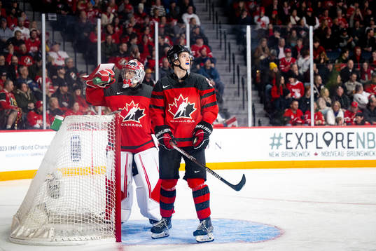 Goalkeeper Thomas Milic and Nolan Allan of Canada look