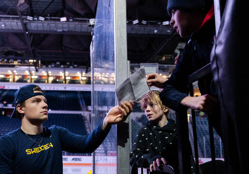 Victor Stjernborg of Sweden signs autographs