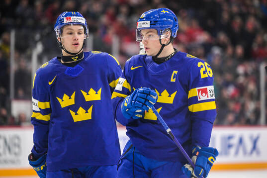 Fabian Lysell and Victor Stjernborg of Sweden looks dejected