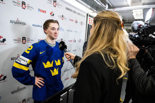 Noah Östlund of Sweden in mixed zone