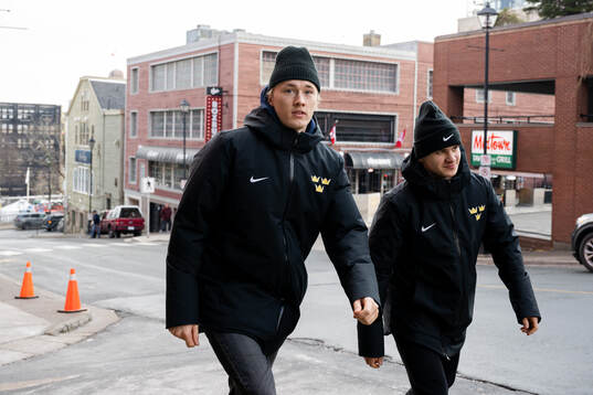 William Strömgren and Jakob Norén of Sweden walks to the