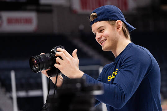 Simon Robertsson of Sweden with a camera