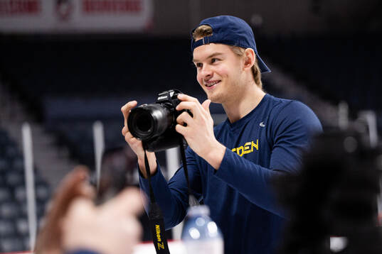 Simon Robertsson of Sweden with a camera