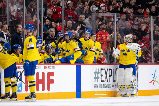 Axel Sandin-Pellikka , Adam Engström and goaltender Carl