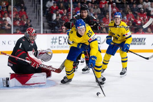 Milton Oscarson of Sweden against goalkeeper Thomas Milic