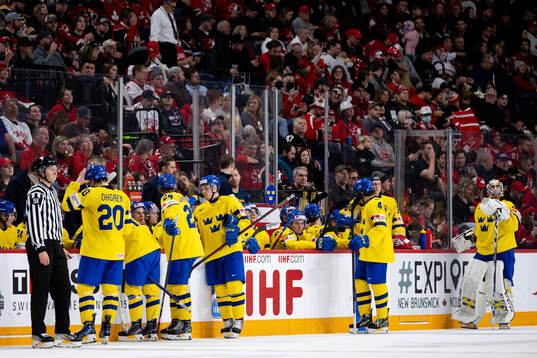 Players of Sweden look dejected