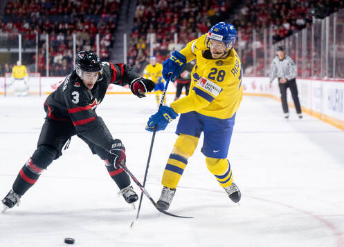 Olen Zellweger of Canada and Simon Robertsson of Sweden