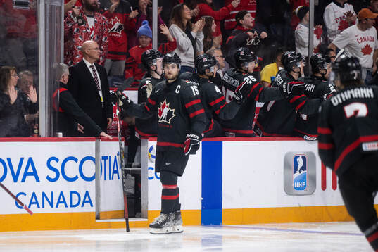 Shane Wright of Canada celebrates the 4-1 goal