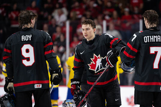 Connor Bedard of Canada celebrates