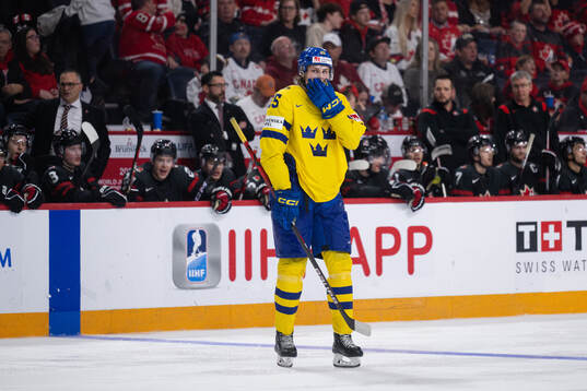 Milton Oscarson of Sweden looks dejected