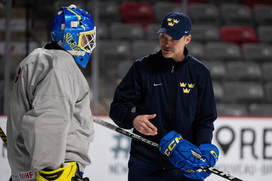 Goaltender Ian Blomquist and Mikael Gerdén, goalie coach