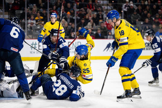 Milton Oscarson of Sweden against Aleksi Malinen and Sami
