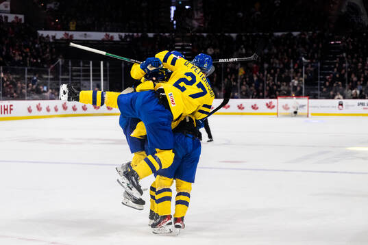 Players of Sweden celebrate the 2-3 goal by Victor