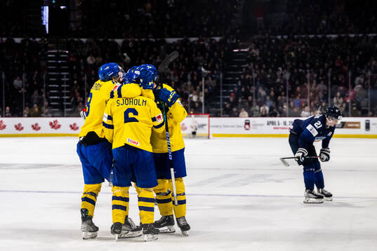 Players of Sweden celebrate the 2-3 goal by Victor