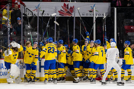 Players of Sweden celebrate