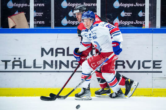 Oskarshamns Myles Powell och Malmö Redhawks Lance Bouma