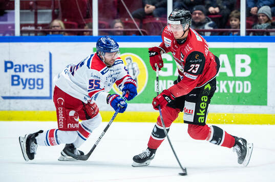 Oskarshamns David Quenneville och Malmö Redhawks Adam