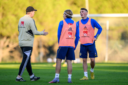 Noah Persson and assistant coach Peter Wettergen of the